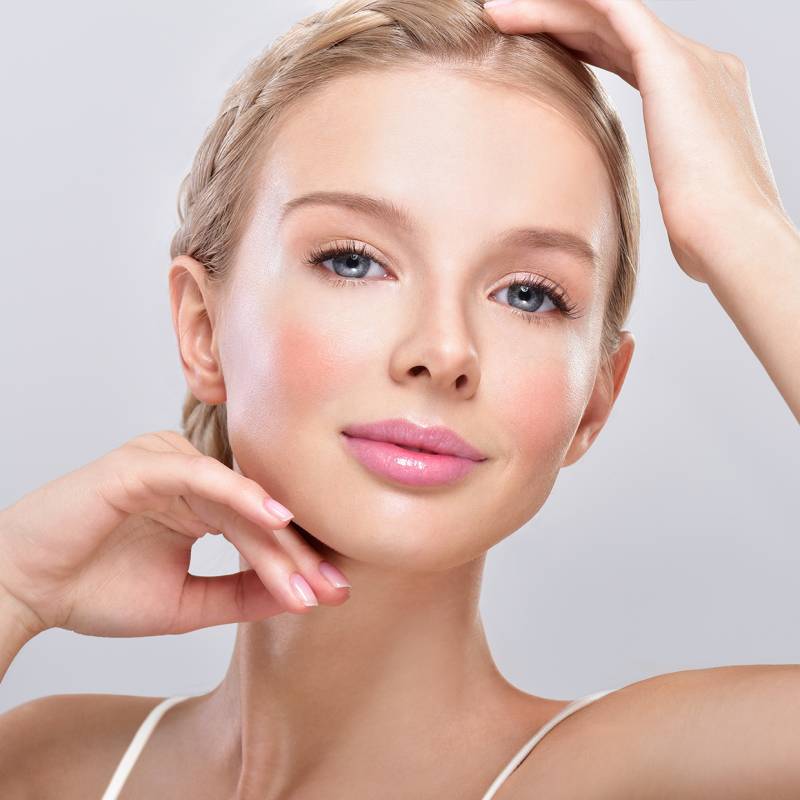 A smiling individual with beautiful, rejuvenated skin; text features a limited-time discount on a skin treatment at Springs Dermatology MD.
