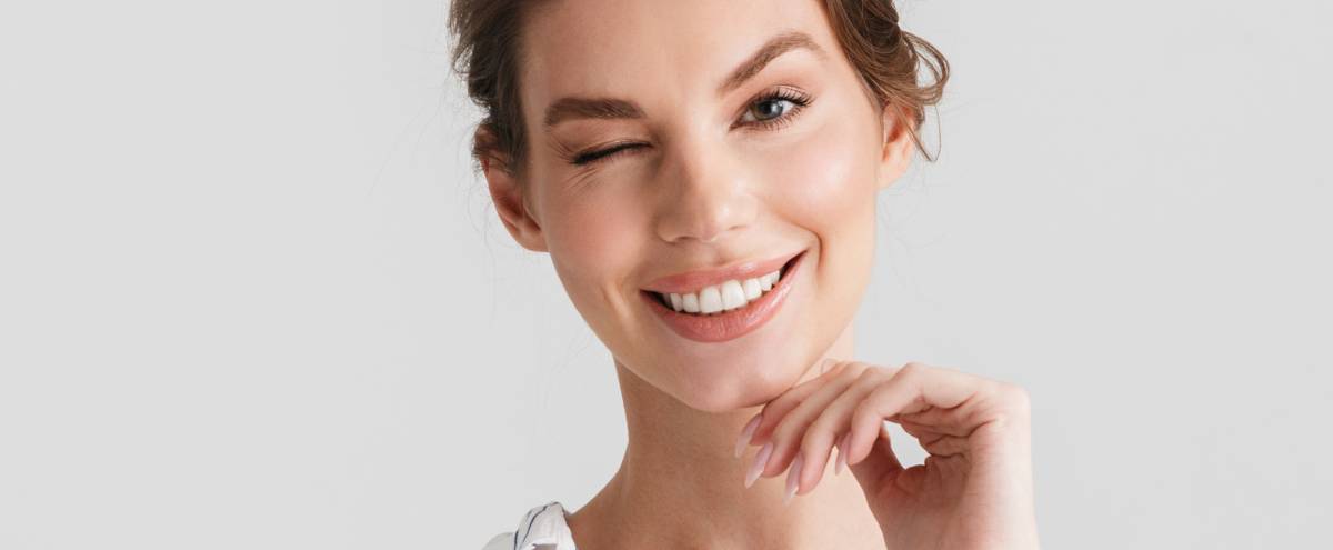 Before and after images showing rejuvenated, healthy skin, highlighting treatment benefits at Springs Dermatology MD.